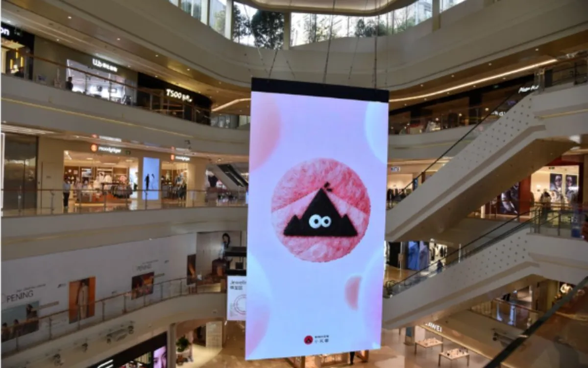 LED sheets hung in the void of a shopping centre atrium
