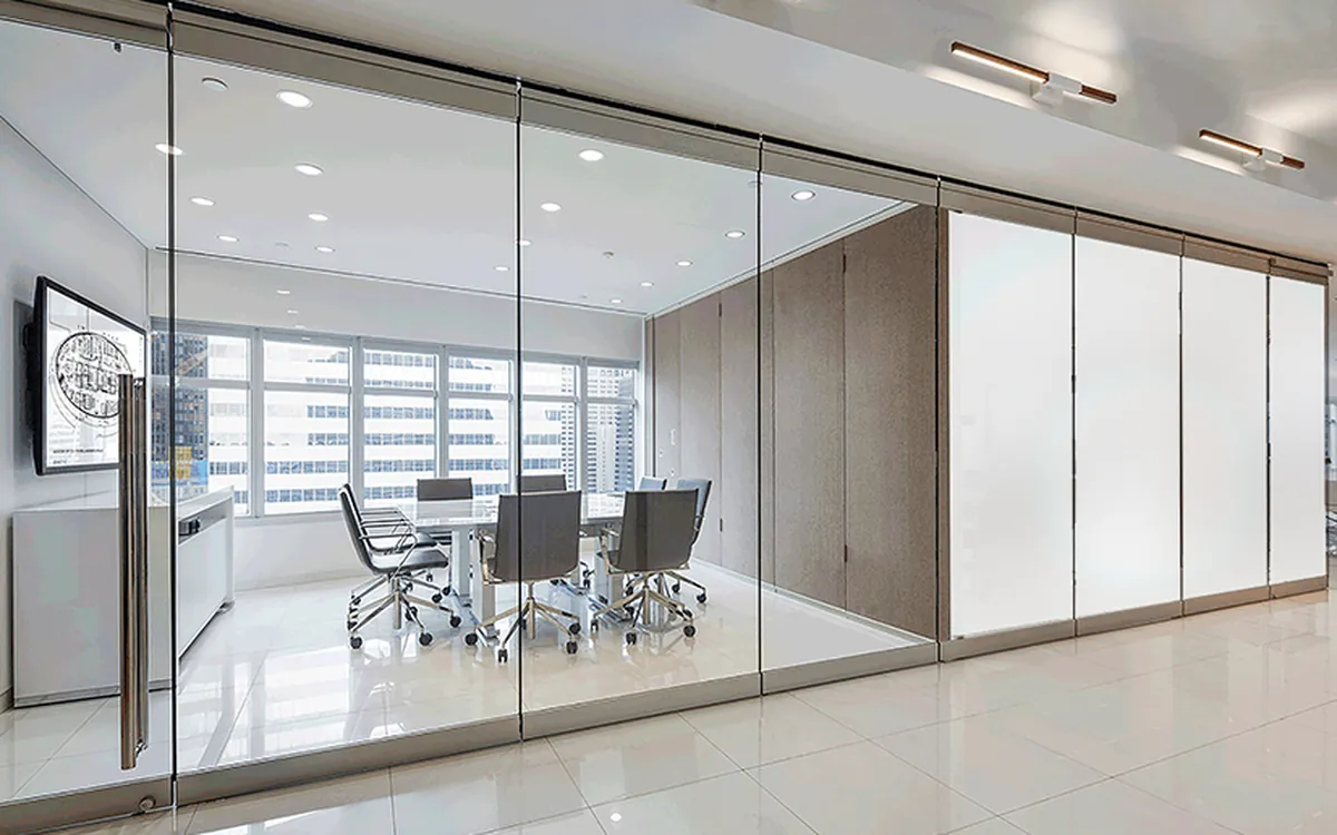Glass office partitions switching between clear and opaque